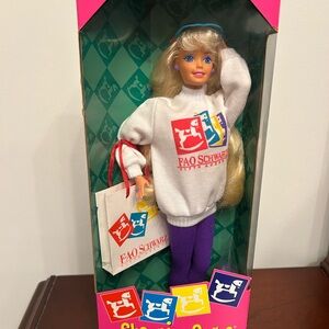 FAO Schwarz White and Yellow Doll with Accessories